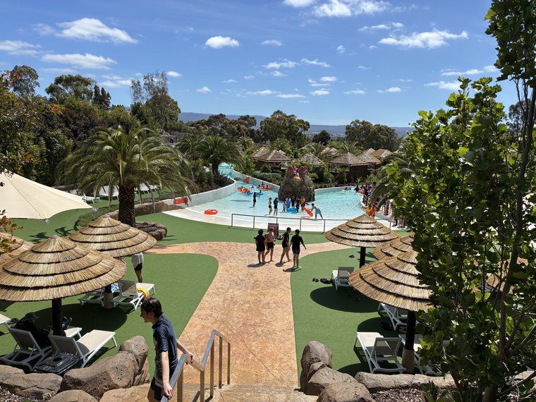 Guest-level amenity with deck, shade and circulation
